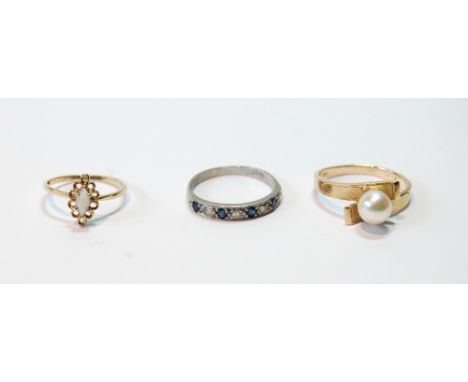 Diamond and sapphire half eternity ring in white gold, '18ct', and a ring with a pearl, probably 18ct gold and another with a