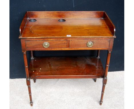 19th century mahogany washstand, the rectangular top with three-quarter gallery over two short drawers, raised on ring turned