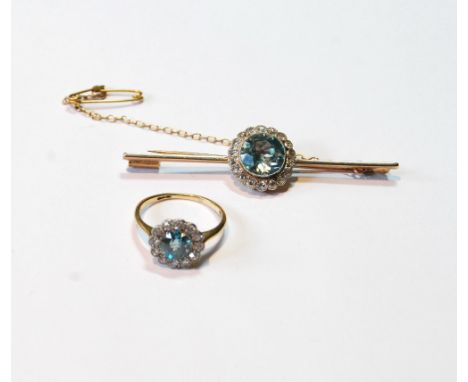 Zircon and diamond cluster ring, 18ct, size L, and the matching bar brooch in gold fronted with platinum.   (2)