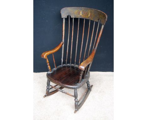 19th century country comb back rocking chair with floral painted top rail, downswept arms and splayed baluster turned legs, 5