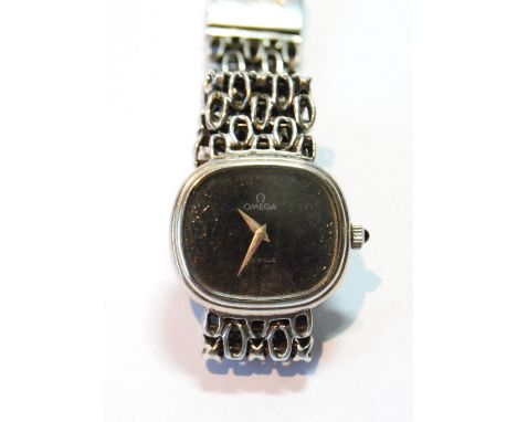 Lady's Omega De Ville silver bracelet watch, 1976. Condition Report Crystal is good.  It's the dial that has crackling to the