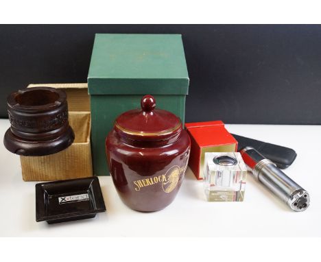 A box of mixed tobacco related collectables to include Sherlock Holmes tobacco jar, ashtray, table lighter...etc. 