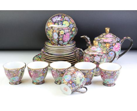 20th Century Chinese Famille Jaune tea set, with Chrysanthemum floral decoration on a black &amp; gilt scrolling ground, seal