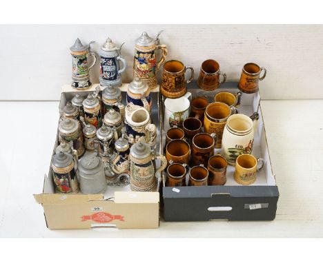 Collection of assorted German beer steins to include musical examples. Tallest measures 27cm tall. Together with a selection 