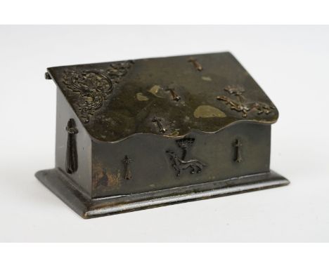 19th century Metal Matchbox / Snuff Box in the form of a Casket with sloping lid and embossed decoration including a Hound wi