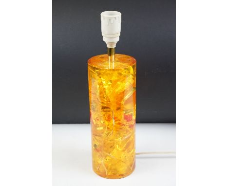 Mid 20th Century faux amber lamp base of cylindrical form with sconce to top. Measures 33cm tall. 
