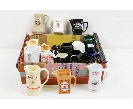 Advertising - A collection of 21 ceramic advertising water jugs, mostly Scotch Whisky examples, featuring Queen Anne, VAT 69,