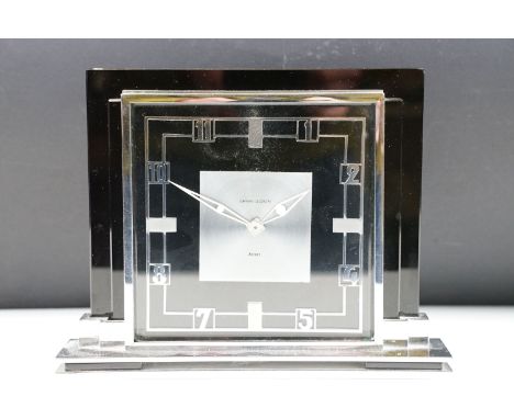 1930s Art Deco Garrard - Le Coultre mantle clock having a square face with chrome arabic numerals to the chapter ring, set wi