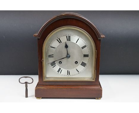 Early 20th Century mahogany mantle clock having a dome top with brushed chapter ring with arabic numerals to the chapter ring