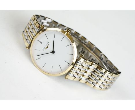 A gents Le Grande Classic De Longines with white enamel dial on original bi metal strap, Longines logo to crown.
