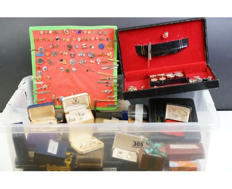 A large collection of gents cufflinks, tie pins and tie clips.