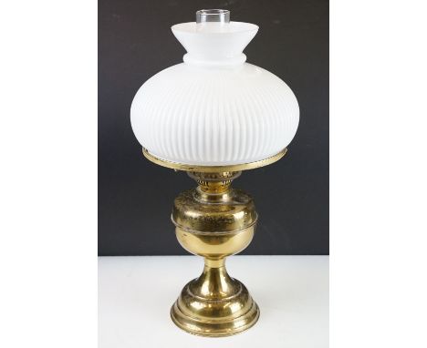 20th Century oil lamp with Austrian white glass shade, chimney, and a gilt metal reservoir &amp; foot. Measures approx 50cm t