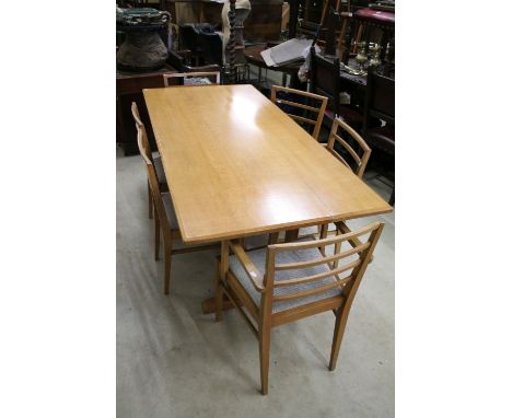 In the manner of Heals of London, Pale Oak Rectangular Dining Room Table with chamfered edge, raised on double chamfered squa
