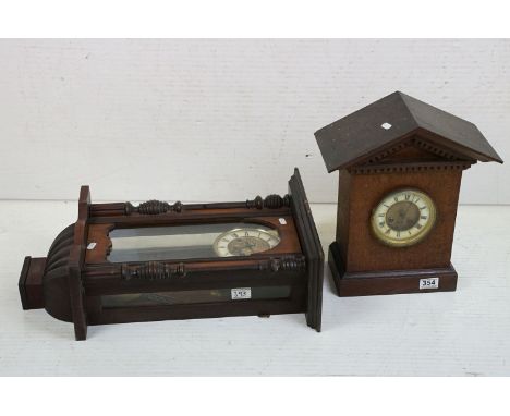 Early 20th Century oak Westminster chime mantle clock together with a Vienna wall clock with art nouveau leaf moulded dial. 