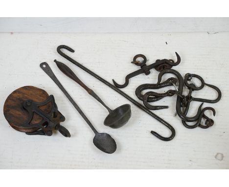 19th century cast iron &amp; wooden pulley wheel (25cm long), together with a wooden handled ladle, hand forged iron spoon, a