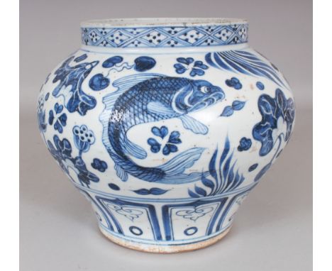 A CHINESE YUAN STYLE BLUE & WHITE PORCELAIN CARP JAR, the base unglazed, 9.4in wide at widest point & 8in high.