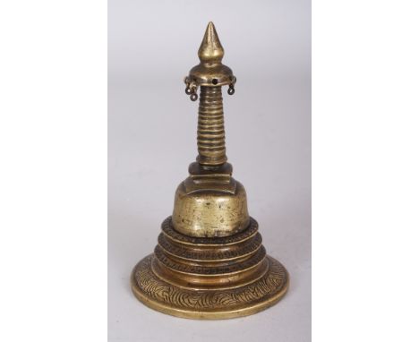 A Small Brass Stupa, Sri Lanka, 18th/19th century, in two sections, of domed form, with flared base, tall shaft with canopy a