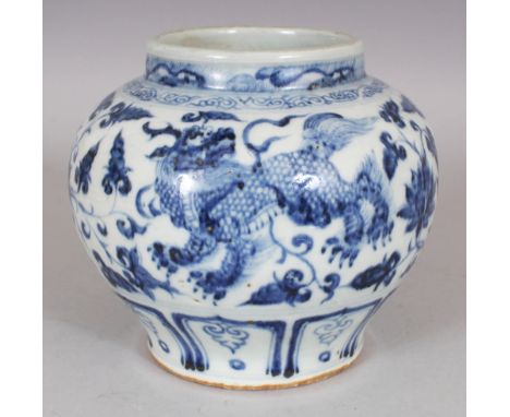 A CHINESE YUAN STYLE BLUE & WHITE PORCELAIN BUDDHISTIC LION JAR, the base unglazed, 6.8in wide at widest point & 6in high.