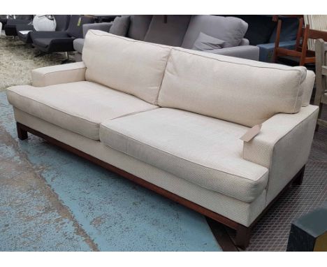 SOFA, contemporary, two seater in a cream fabric on square supports, 209cm L.