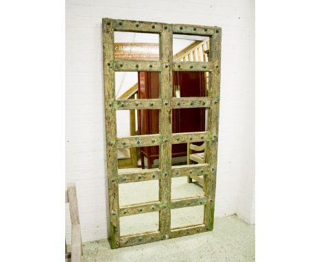 WALL MIRROR, vintage Indian teak with eight metal studded sections, 182cm H x 97cm.