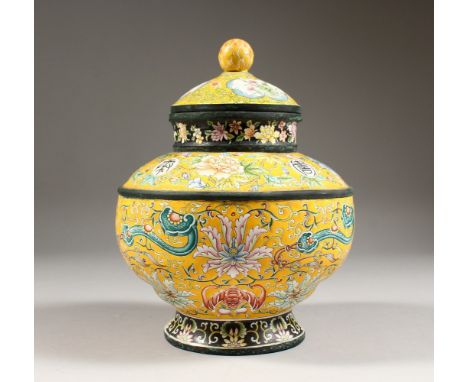 A GOOD QUALITY CHINESE ENAMEL JAR &amp; COVER, the enamel jar with decoration depicting panels of birds amongst flora, with f