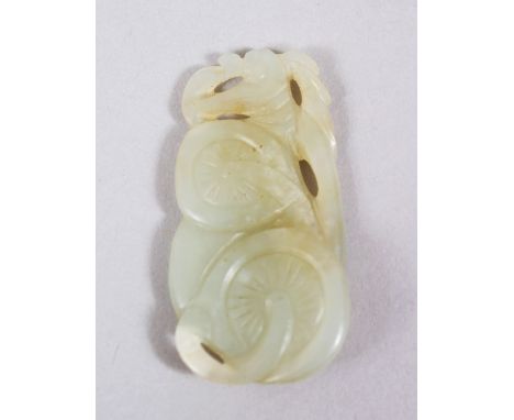 A GOOD 18TH / 19TH CENTURY CHINESE WHITE JADE PENDANT OF MUSHROOMS, 5.4cm wide X 2.5cm deep.