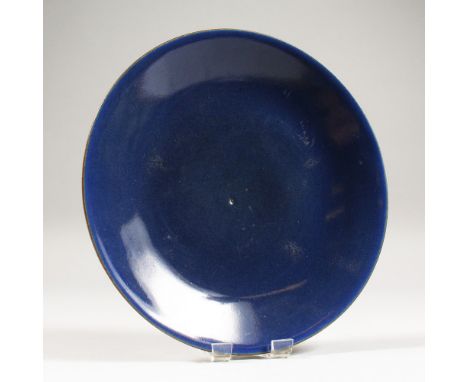 AN EARLY 19TH CENTURY CHINESE PROVINCIAL POWDER BLUE PORCELAIN DISH, the base with a stylised Jiaqing seal mark, 7.6in(19.3cm