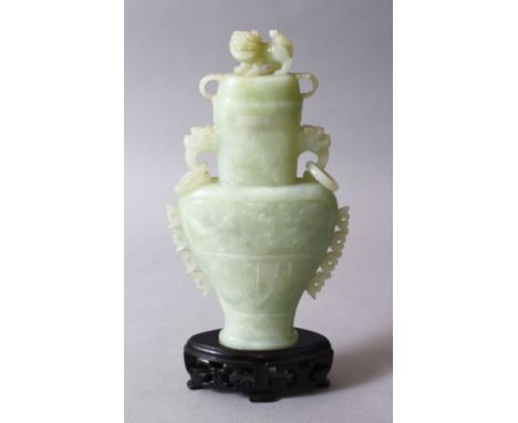 A GOOD 19TH / 20TH CENTURY JADE / JADELIKE CARVED LIDDED CENSER, the lidded censer stood upon a carved hardwood stand, the ce