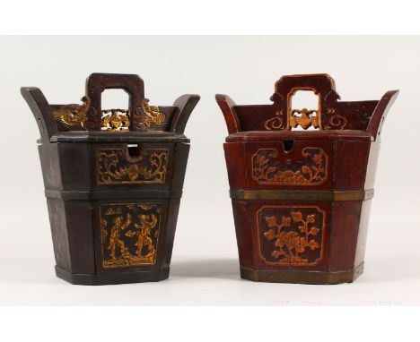 A GOOD PAIR OF 18TH / 19TH CENTURY CHINESE WOODEN LIDDED CANISTERS, decorated with gilt highlighted dragons, figures and flor