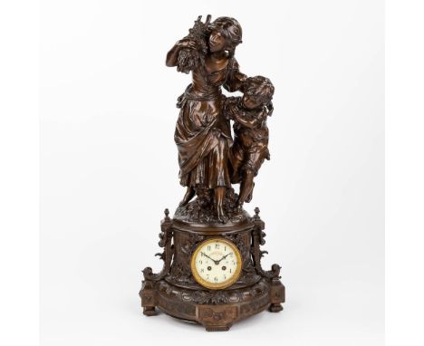 Auguste MOREAU (1834-1917) 'Mother and child with a harvest'A mantle clock, patinated spelter.&nbsp;Circa 1900.&nbsp;Conditio