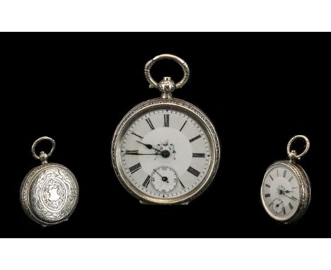 A Continental Silver Fob Watch, white enamel dial, with Roman Numerals and subsidiary seconds. Key Wind. Ticking stop starter