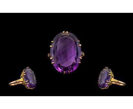 Ladies 9ct Gold Large Faceted Single Stone Amethyst Set Dress Ring from the 1960's. The faceted amethyst of superb colour/cla