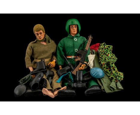 Two Vintage Action Men along with outfits and accessories.  One is dressed in green jumpsuit with helmet, and one is dressed 