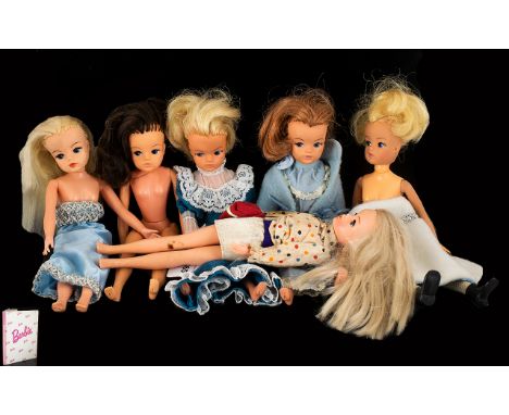 Collection of Vintage Sindy Dolls dating from the 1970s, six in total.  One blonde Sindy with long hair in a blue evening dre