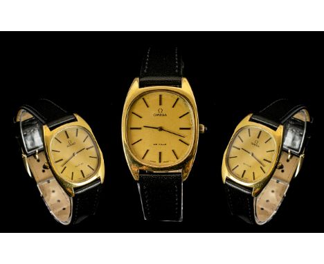 Omega De Ville Swiss Made Gentleman's Gold Plated Wrist Watch, Complete with Black Leather Strap and Gilded Oblong Shaped Dia