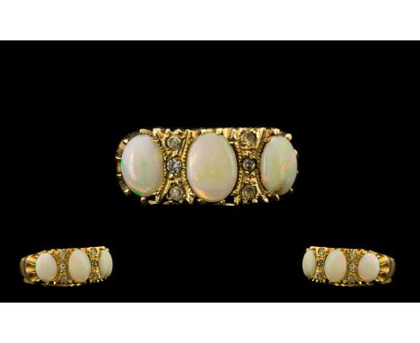 Antique Period 9ct Gold Opal and Diamond Dress Ring gypsy setting. marked 9ct gold. Ring size N 4.6 grams. All aspects of con