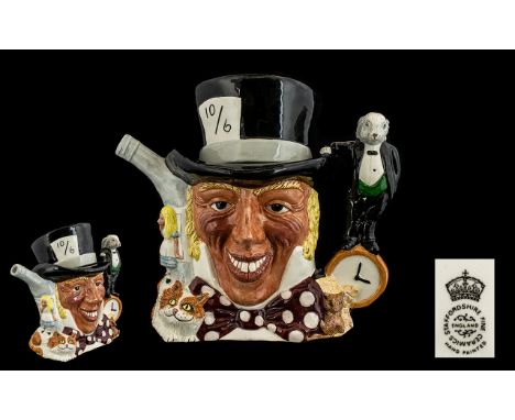 Staffordshire Hand Painted Tea Pot in the form of The Mad Hatter.  Handle in the form of small rabbit standing on a clock, th