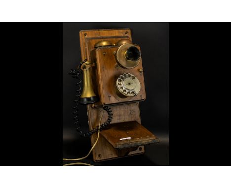 Vintage Wall Telephone in oak wood with side receiver and twin bells to top.  Has been adapted to be compatible with modern s