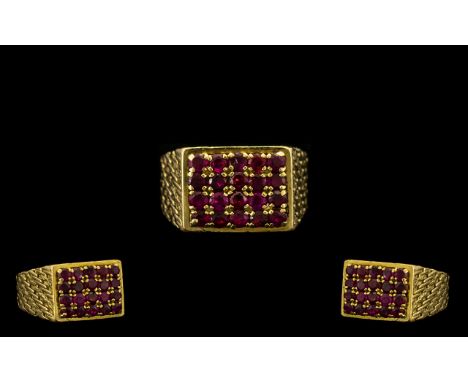 18ct Gold Superb Quality Ruby Set Dress Ring of Solid Construction. Set with 20 faceted rubies of pigeon blood colour. Top gr