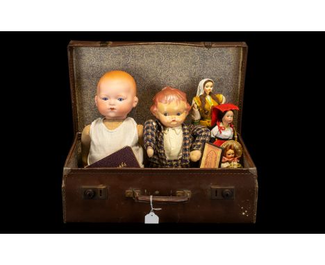 Collection of Vintage Dolls in suitcase, includes:  Armand Marseille bisque headed baby doll with moveable arms and legs and 