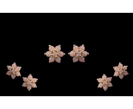 Pink Opal Flower Cluster Earrings, each earring comprising seven round cut pink opals, set in silver, totalling 1.5cts