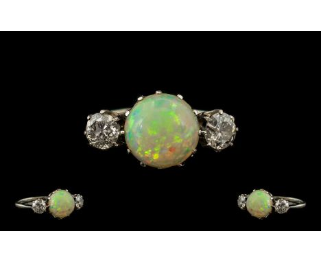 18ct White Gold Nice Quality &amp; Attractive 3 Stone Opal &amp; Diamond Dress Ring.  Raised gallery setting.  The central ca