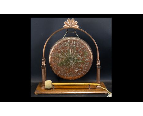 Vintage Gong with stand and striker.  Attractive Art Deco style frame raised on wooden plinth with striker.  In good conditio