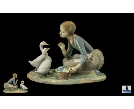 Lladro - Porcelain Figure Group ' Feeding the Ducks ' Model No 4849. Issued 1973 - 1995. Height 6.5 Inches - 16.25 cm. 1st Qu