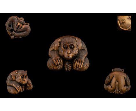 Japanese - Fine Quality and Signed Carved Boxwood Netsuke Meiji Period 1864 - 1912. A ' Crouching Monkey ' Wearing a Waistcoa