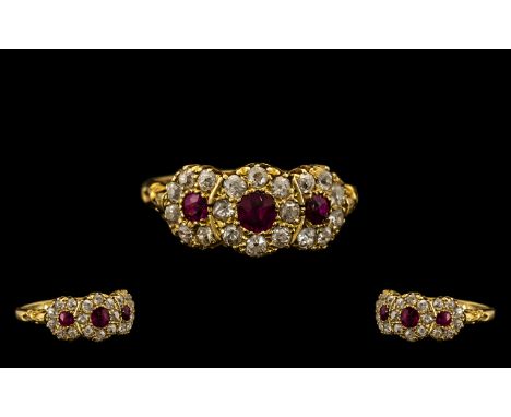 Edwardian Period Well Made and Attractive 18ct Gold Ruby and Diamond Set Dress Ring of pleasing design and quality. 3 flower 