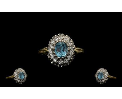 18ct Gold - Aquamarine and Diamond Set Cluster Ring, Flower head Design. Excellent Gallery Setting. The Faceted Aquamarine of