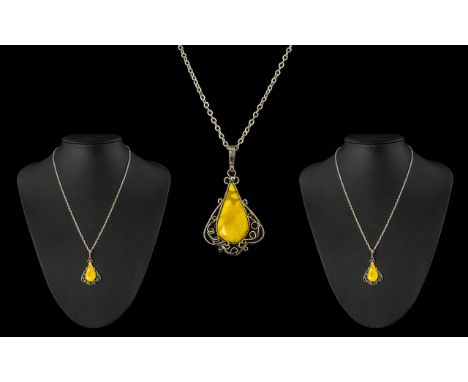 Vintage Sterling Silver Butterscotch Amber Pendant &amp; Chain.  Pendant 3.6 cm, chain 46 cm.  Weight approx 6.1 gms.  Pendan