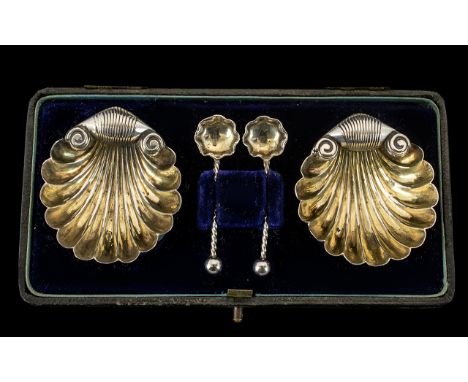 A Pair of Shell Formed Victorian Salts in fitted case with matching salt spoons. Hallmarked for Birmingham R - 1891. Raised o