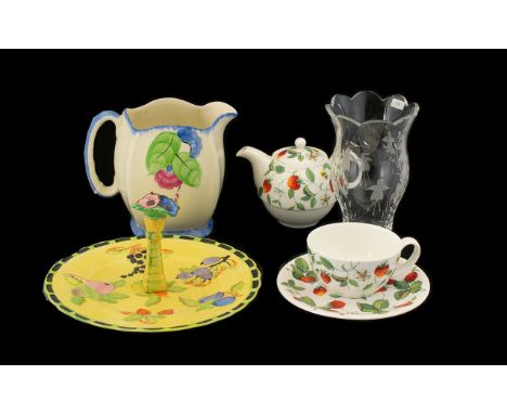 Collection of Decorative Pottery to include a large decorative jug of cream ground with floral design and blue trim, marks to